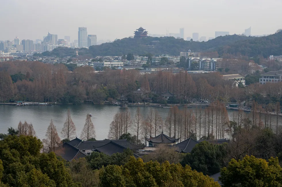 A panoramic view of West Lake and the Hangzhou skyline.